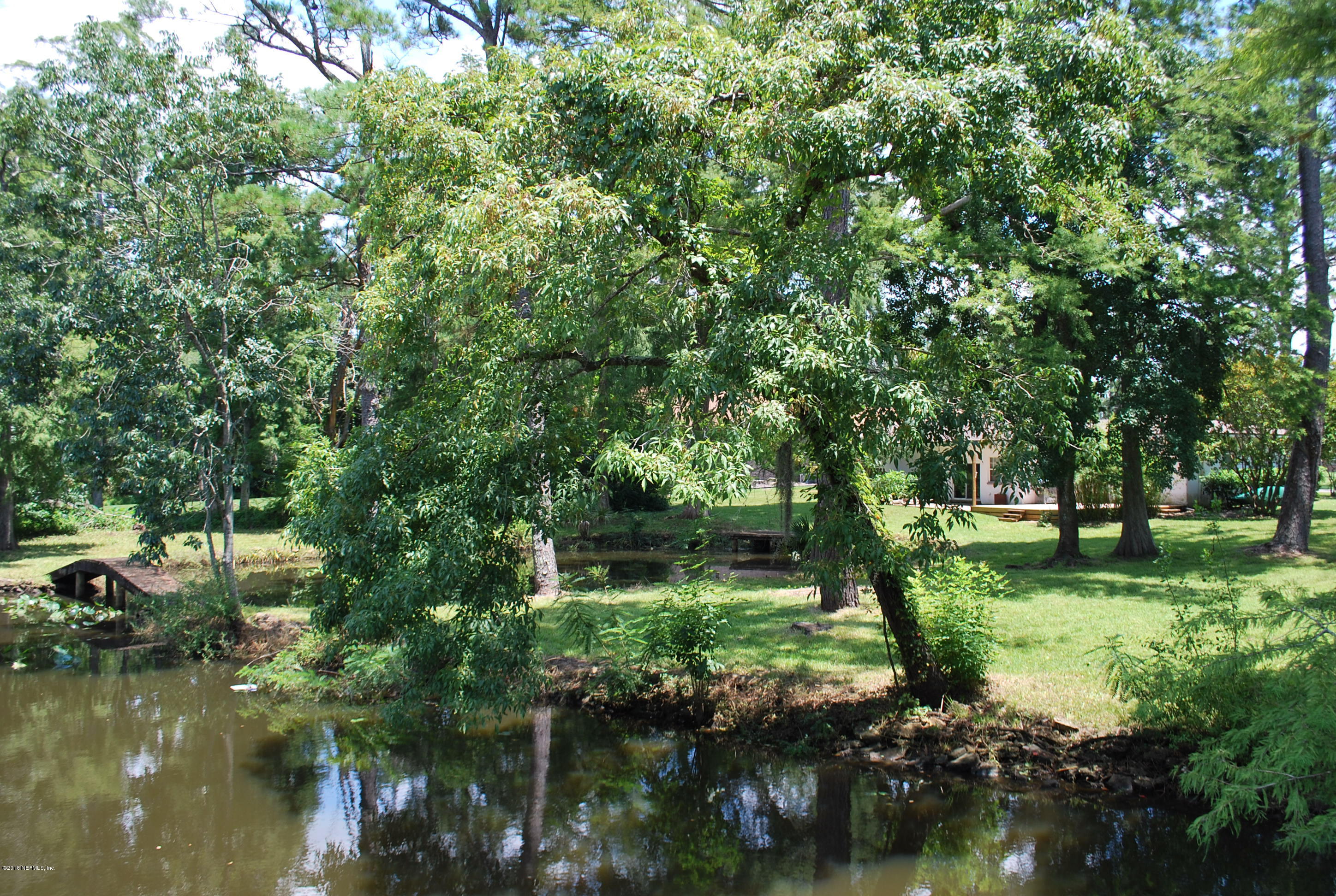 8811 Sanchez Road Jacksonville, FL 32217 - Photo 40 of 52 a view of a lake with houses