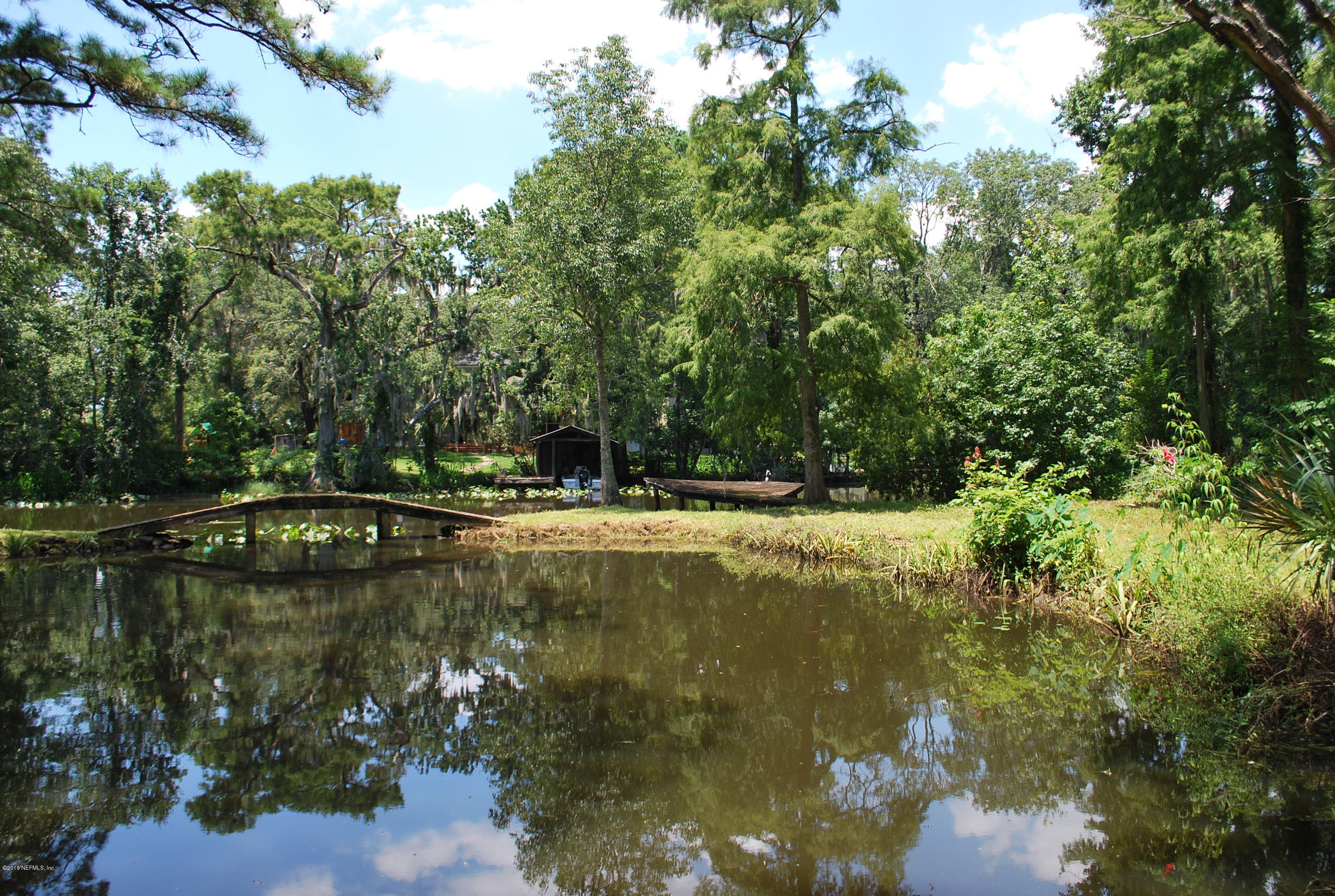 8811 Sanchez Road Jacksonville, FL 32217 - Photo 45 of 52 a view of swimming pool with a yard