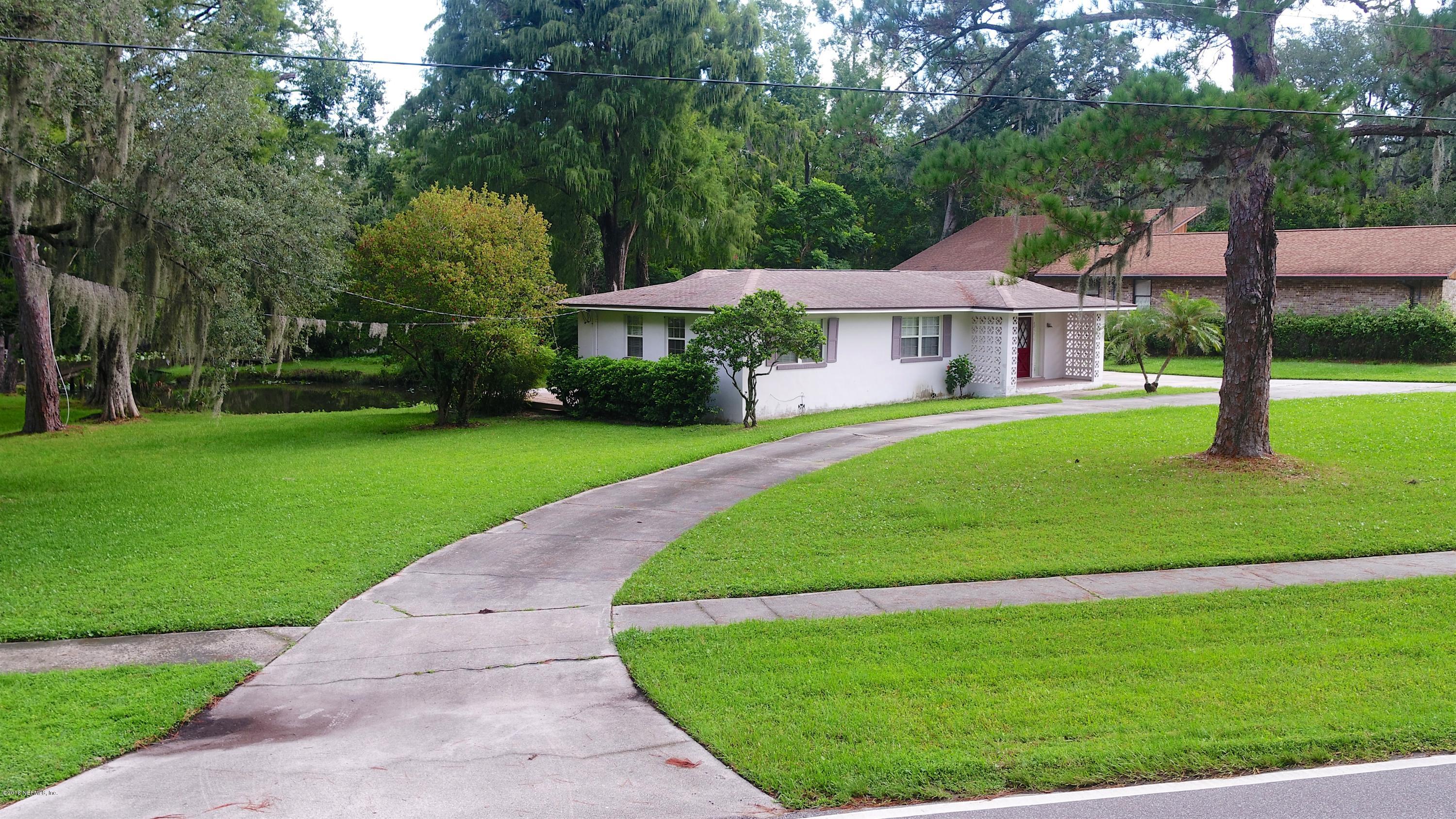 8811 Sanchez Road Jacksonville, FL 32217 - Photo 48 of 52 a view of a patio with a garden