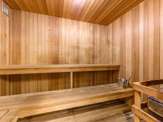 a view of room with window and curtain