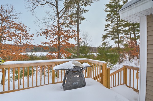 13 C Trail Ridge Way, Unit 47AR Harvard, MA 01451 - Photo 27 of 30 a view of a balcony with wooden floor and fence