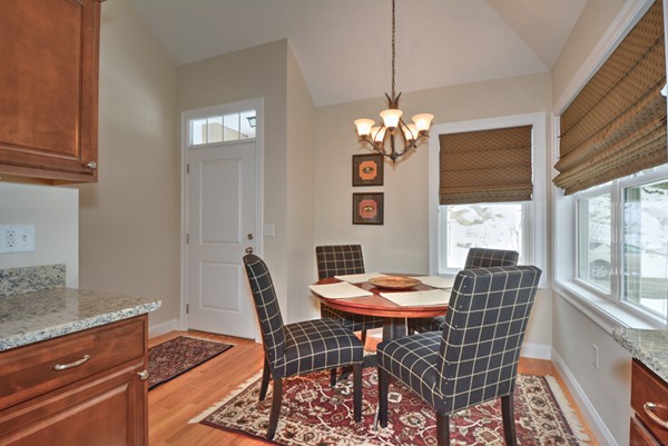 13 C Trail Ridge Way, Unit 47AR Harvard, MA 01451 - Photo 7 of 30 a dining room with furniture a rug and a chandelier