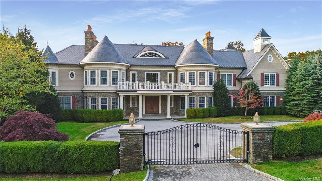 1 Brook View Lane Rye, NY 10580 - Photo 1 of 1 a front view of a house with a garden