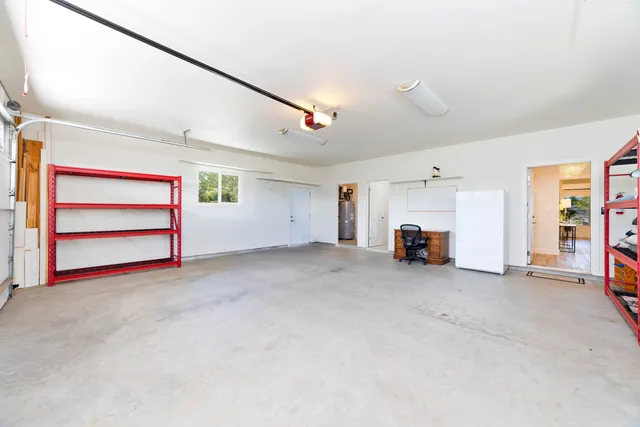a view of empty room with closet and ceiling fan