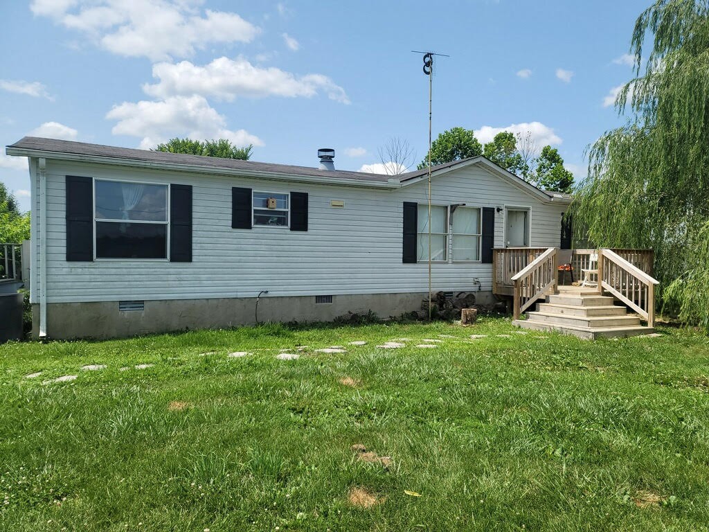 243 Old Martin Chapel Road Portland, TN 37148 - Photo 1 of 1 a front view of a house with a yard
