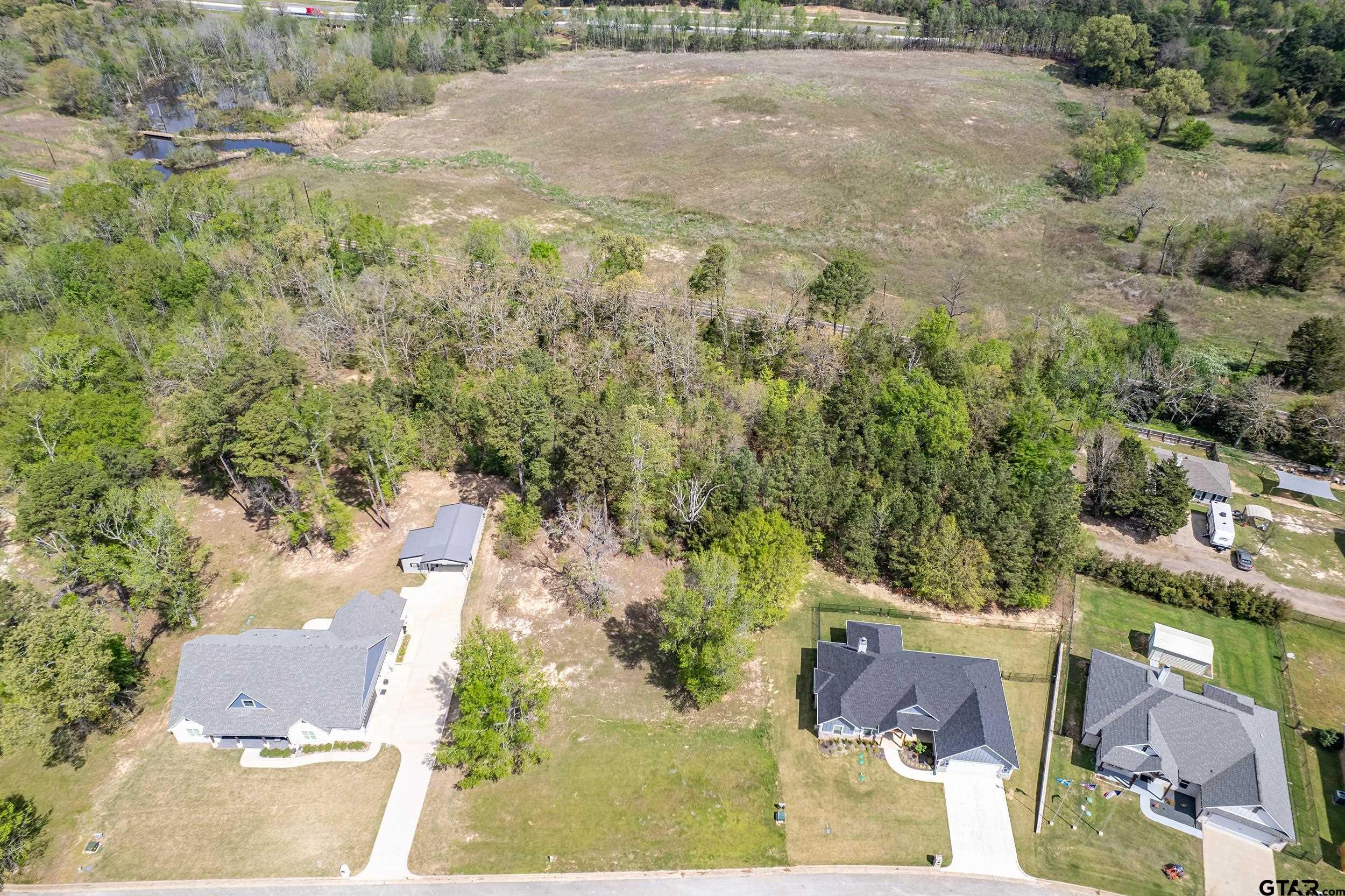 24070 Sun Ridge Road Lindale, TX 75771 - Photo 12 of 20 an aerial view of residential house with outdoor space