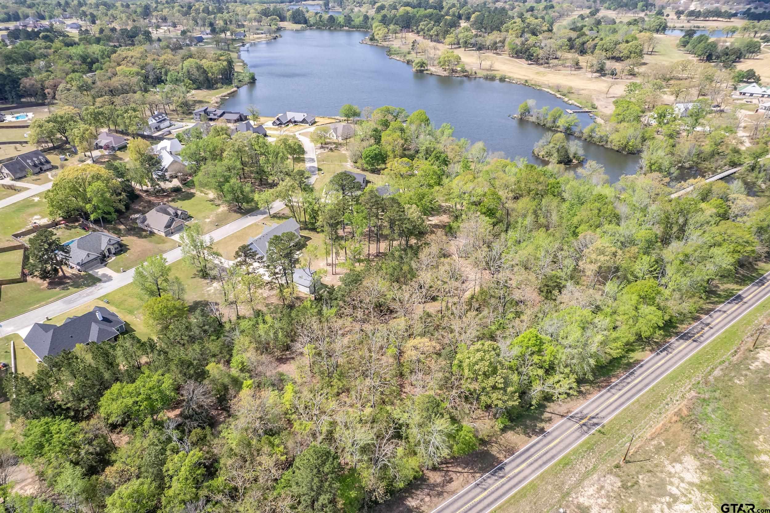 24070 Sun Ridge Road Lindale, TX 75771 - Photo 13 of 20 view of a lake with an outdoor space
