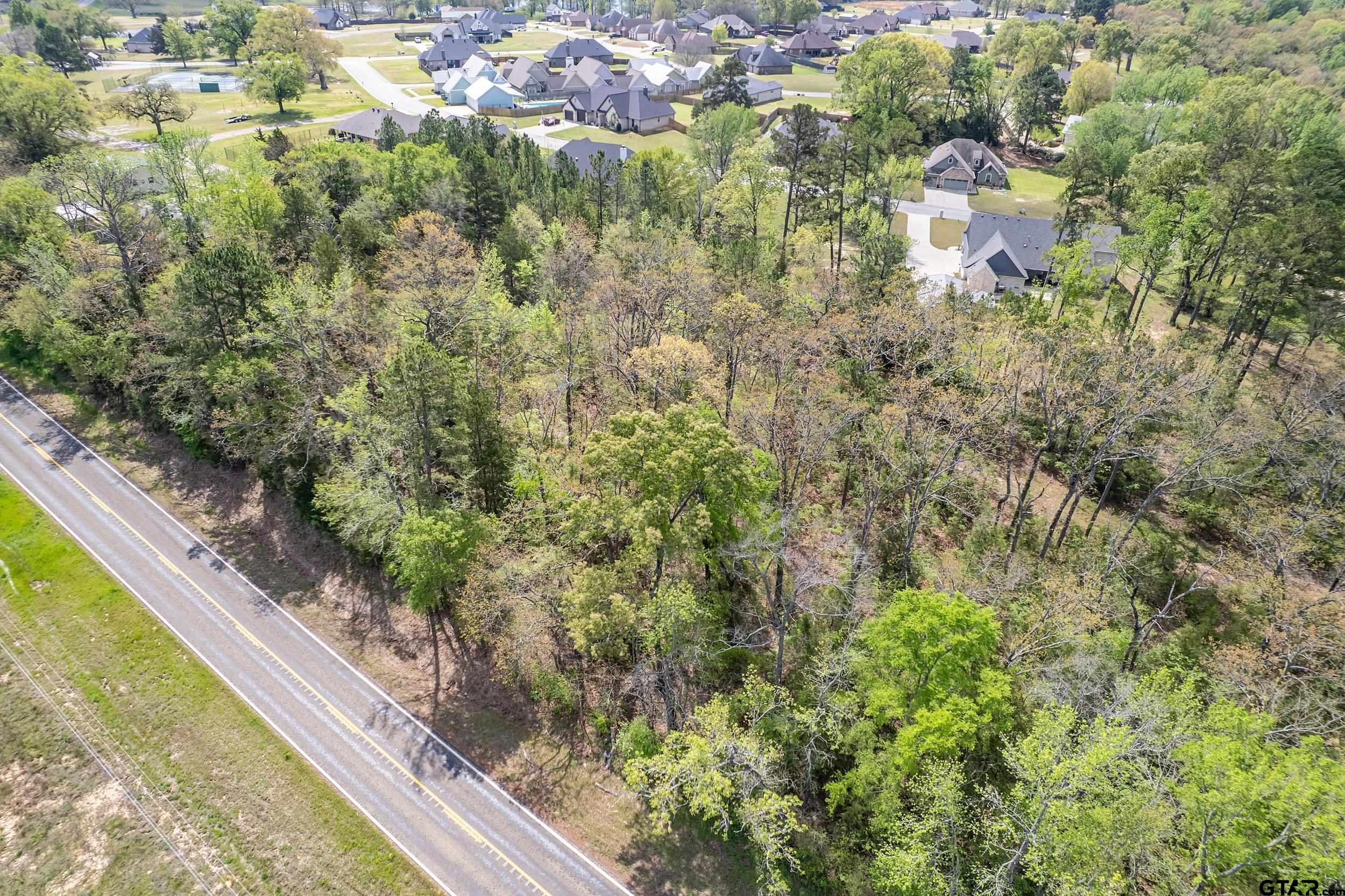24070 Sun Ridge Road Lindale, TX 75771 - Photo 16 of 20 a view of a lake from a balcony
