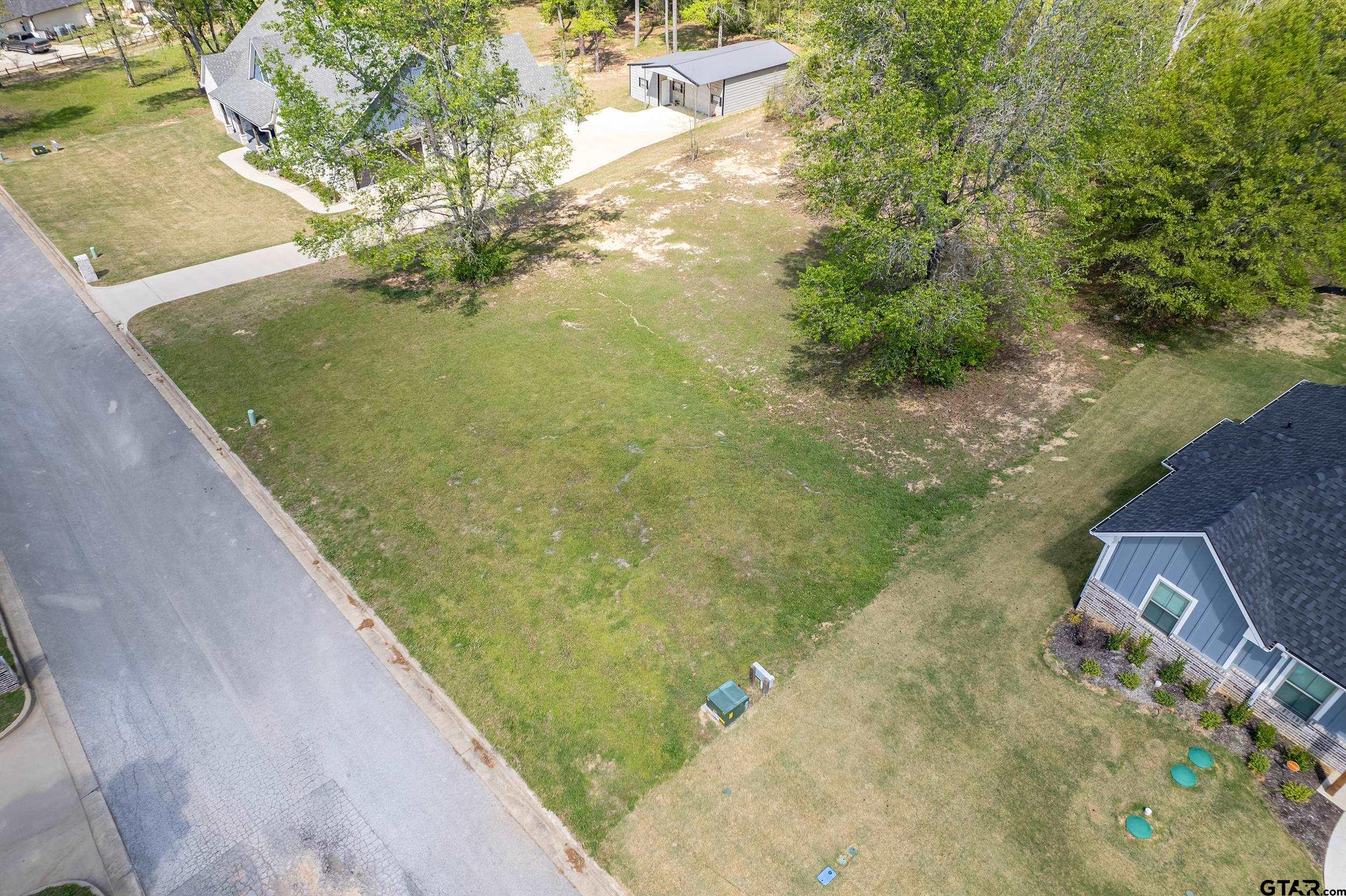 24070 Sun Ridge Road Lindale, TX 75771 - Photo 20 of 20 a view of a lake from a balcony