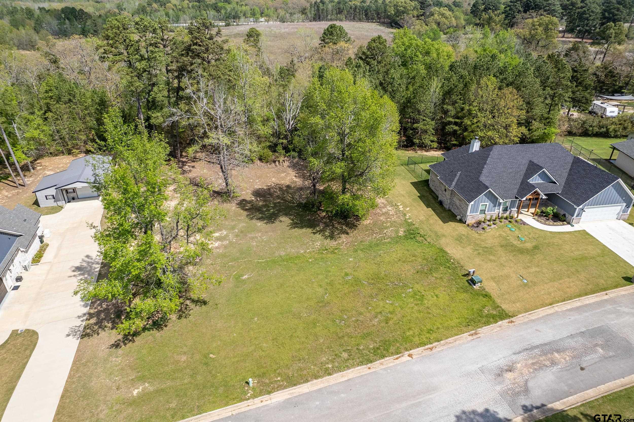 24070 Sun Ridge Road Lindale, TX 75771 - Photo 10 of 20 a view of yard from a balcony