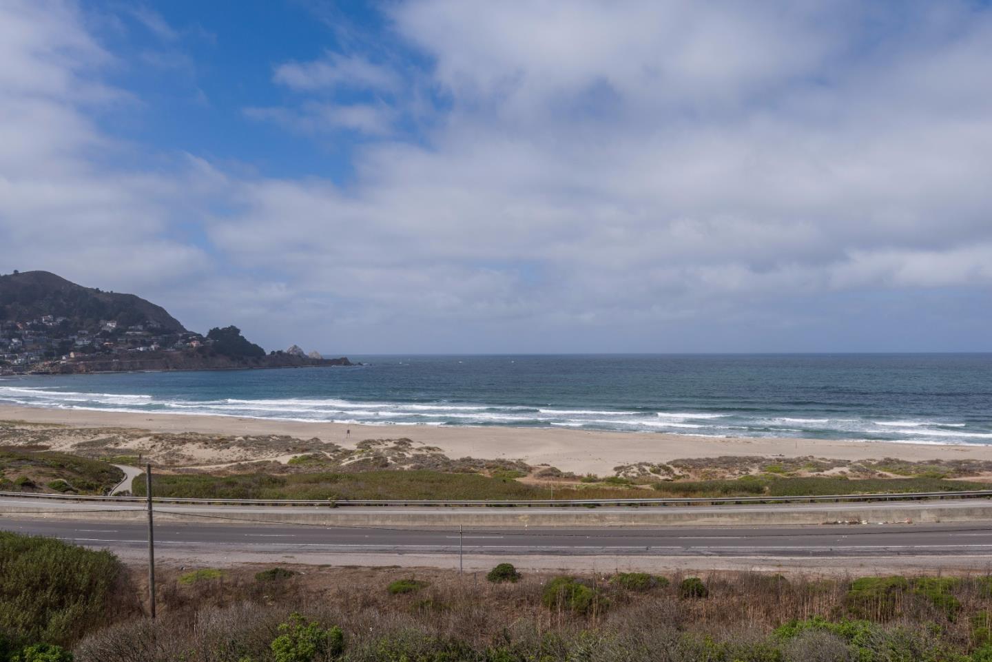 465 Roberts Road Pacifica, CA 94044 - Photo 17 of 20 a view of an ocean and a mountain