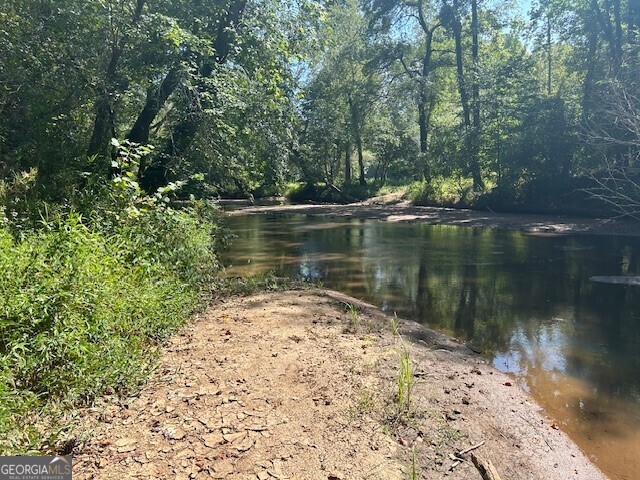 0 Bullock Bridge Road, Unit TRACT 1 Loganville, GA 30656 - Photo 2 of 36 a view of a lake