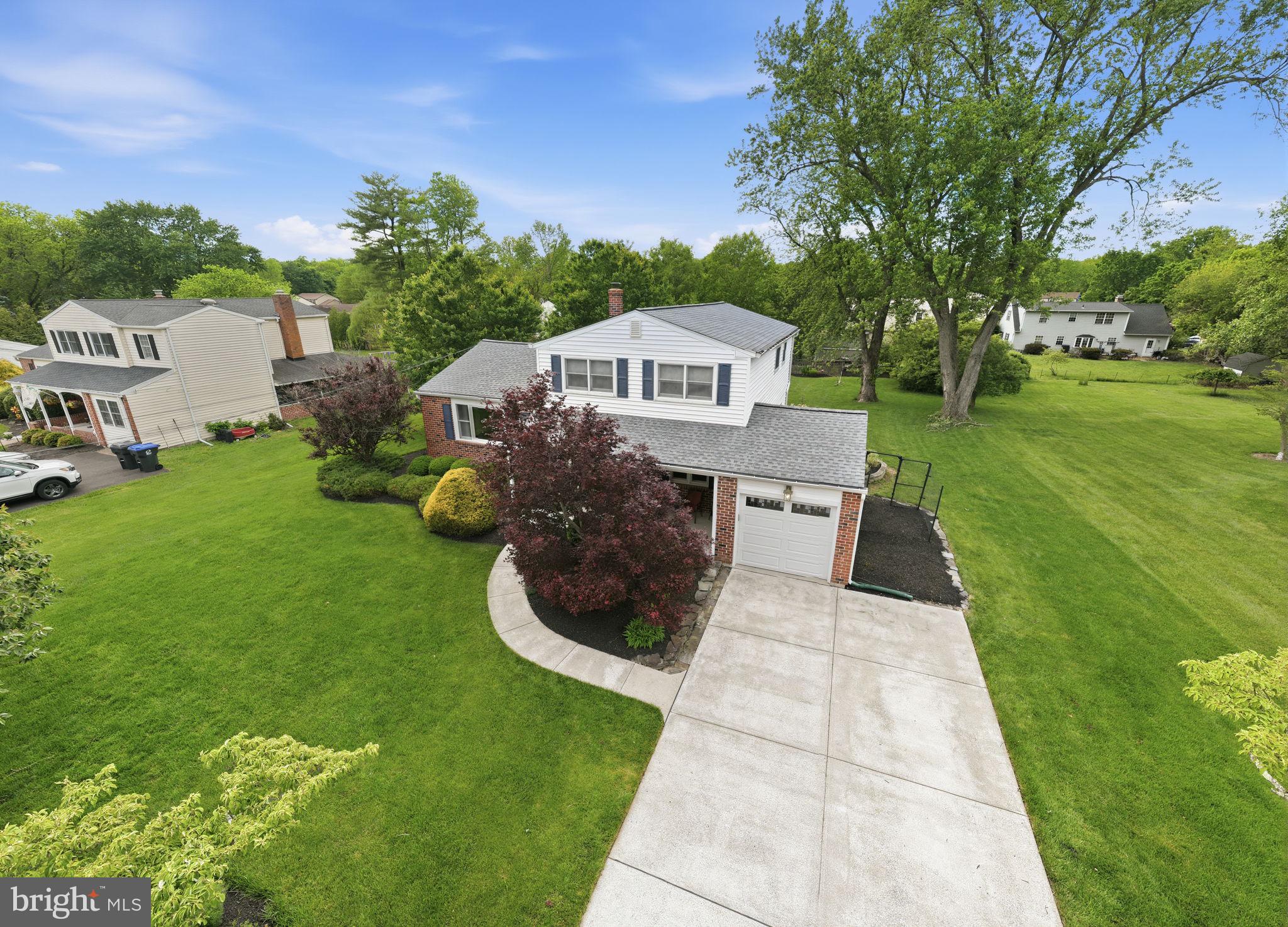 81 Cherokee Road Doylestown, PA 18901 - Photo 2 of 43 a front view of a house with a yard