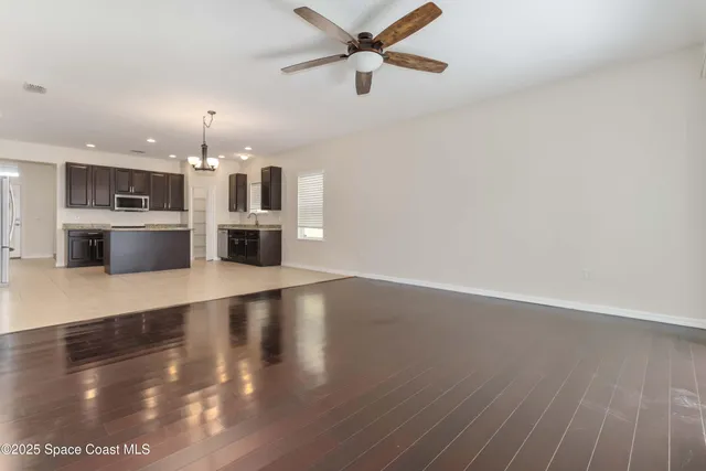 a view of kitchen and windows