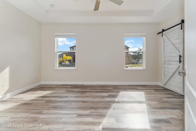 a view of an empty room and window