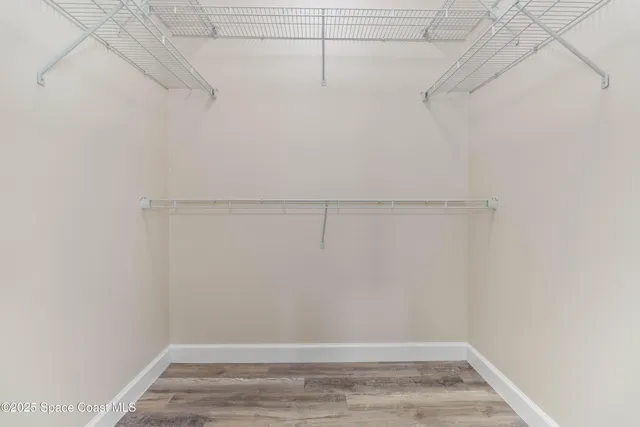 a view of a room with racks on the wall