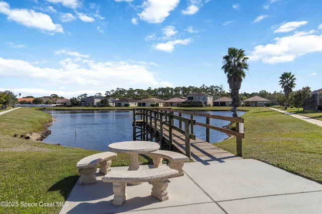a view of a chairs and table on the terrace