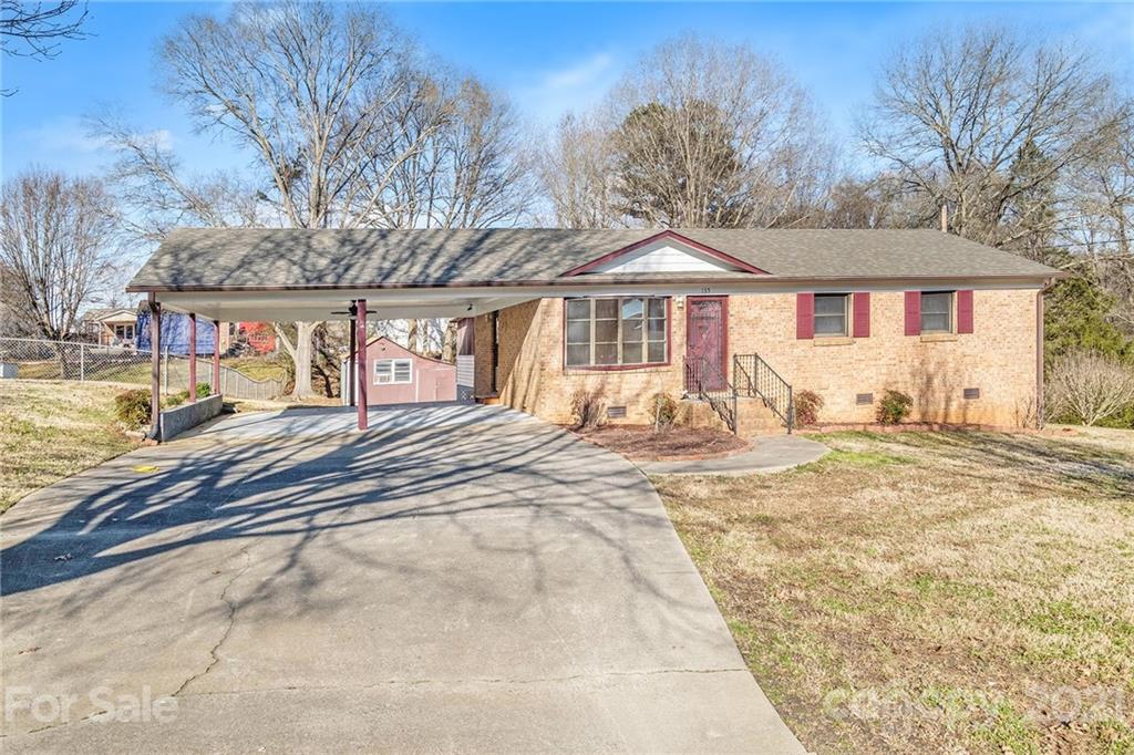 135 Eller Road Gastonia, NC 28056 - Photo 1 of 17 a front view of a house with a yard