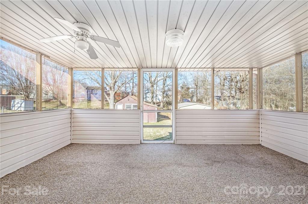 135 Eller Road Gastonia, NC 28056 - Photo 12 of 17 a view of a room with large windows