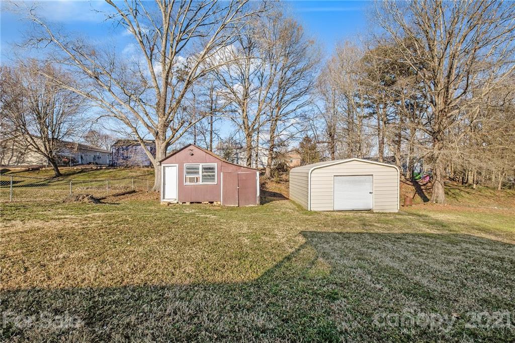 135 Eller Road Gastonia, NC 28056 - Photo 17 of 17 a view of a large tree with a yard