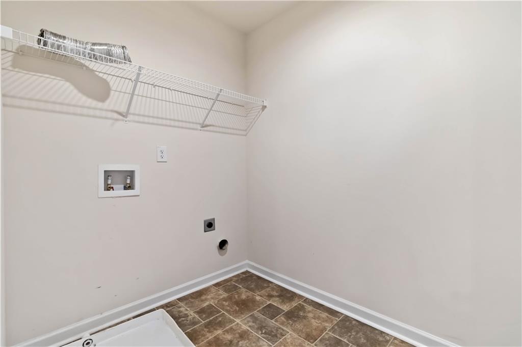 156 Beaumont Way Hampton, GA 30228 - Photo 15 of 21 a view of utility room