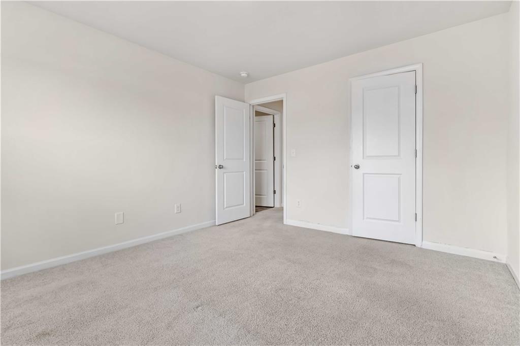 156 Beaumont Way Hampton, GA 30228 - Photo 16 of 21 a view of an empty room