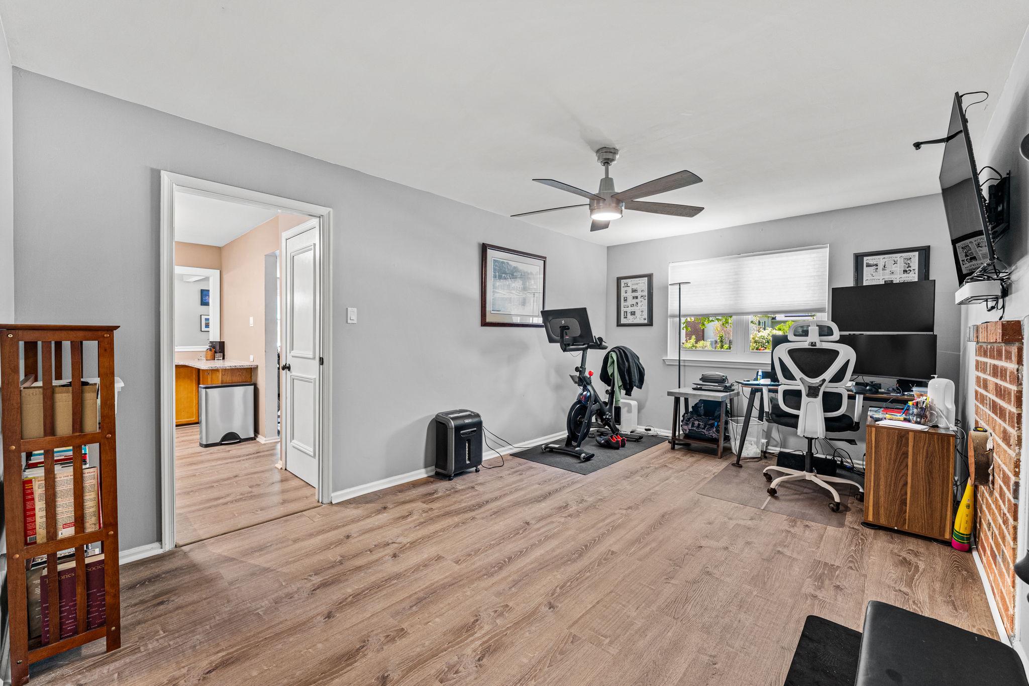 182 Wagon Wheel Road Norristown, PA 19403 - Photo 22 of 44 a view of a workspace with furniture and a livingroom