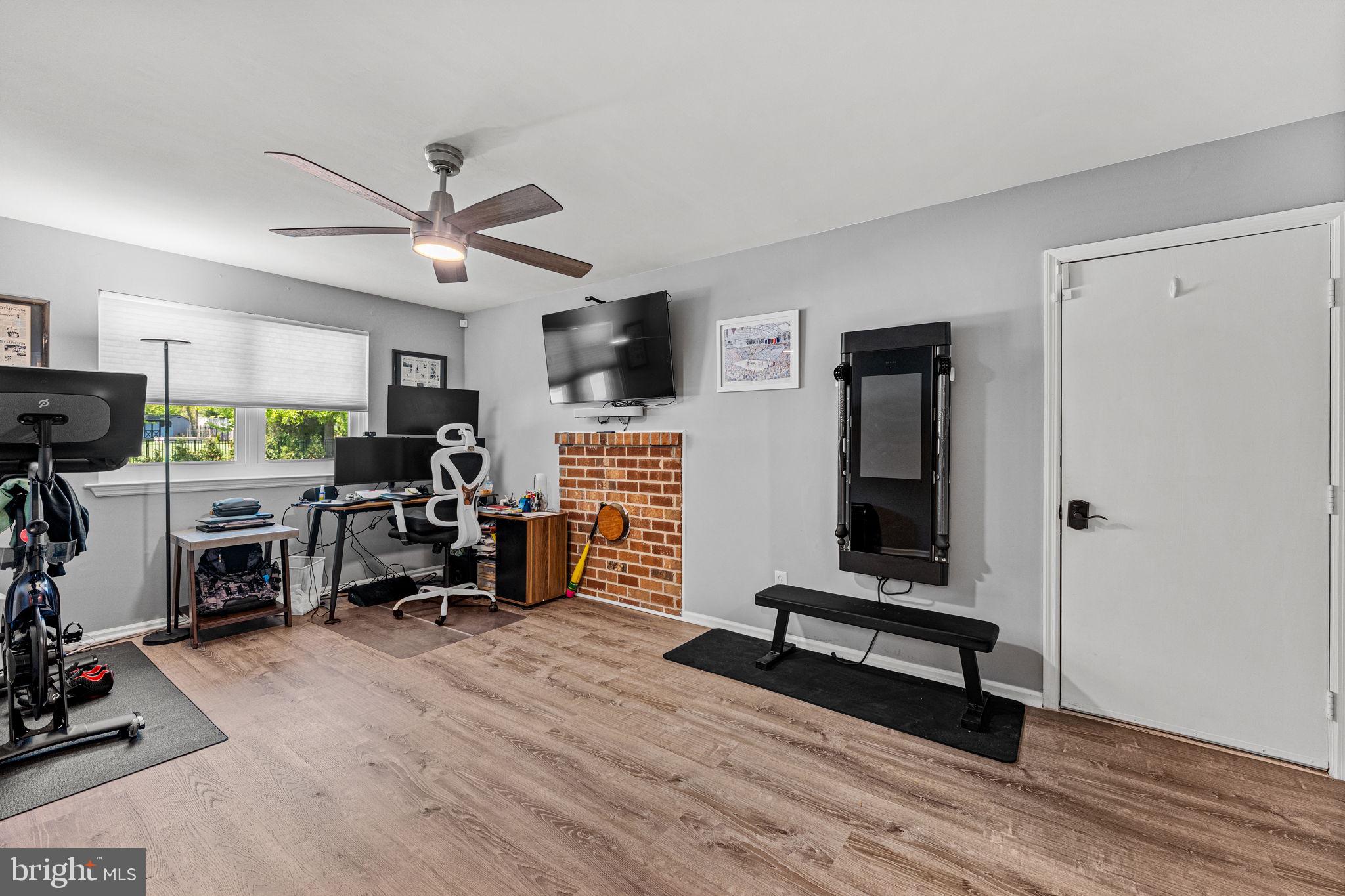 182 Wagon Wheel Road Norristown, PA 19403 - Photo 23 of 44 a view of a livingroom with workspace and a window