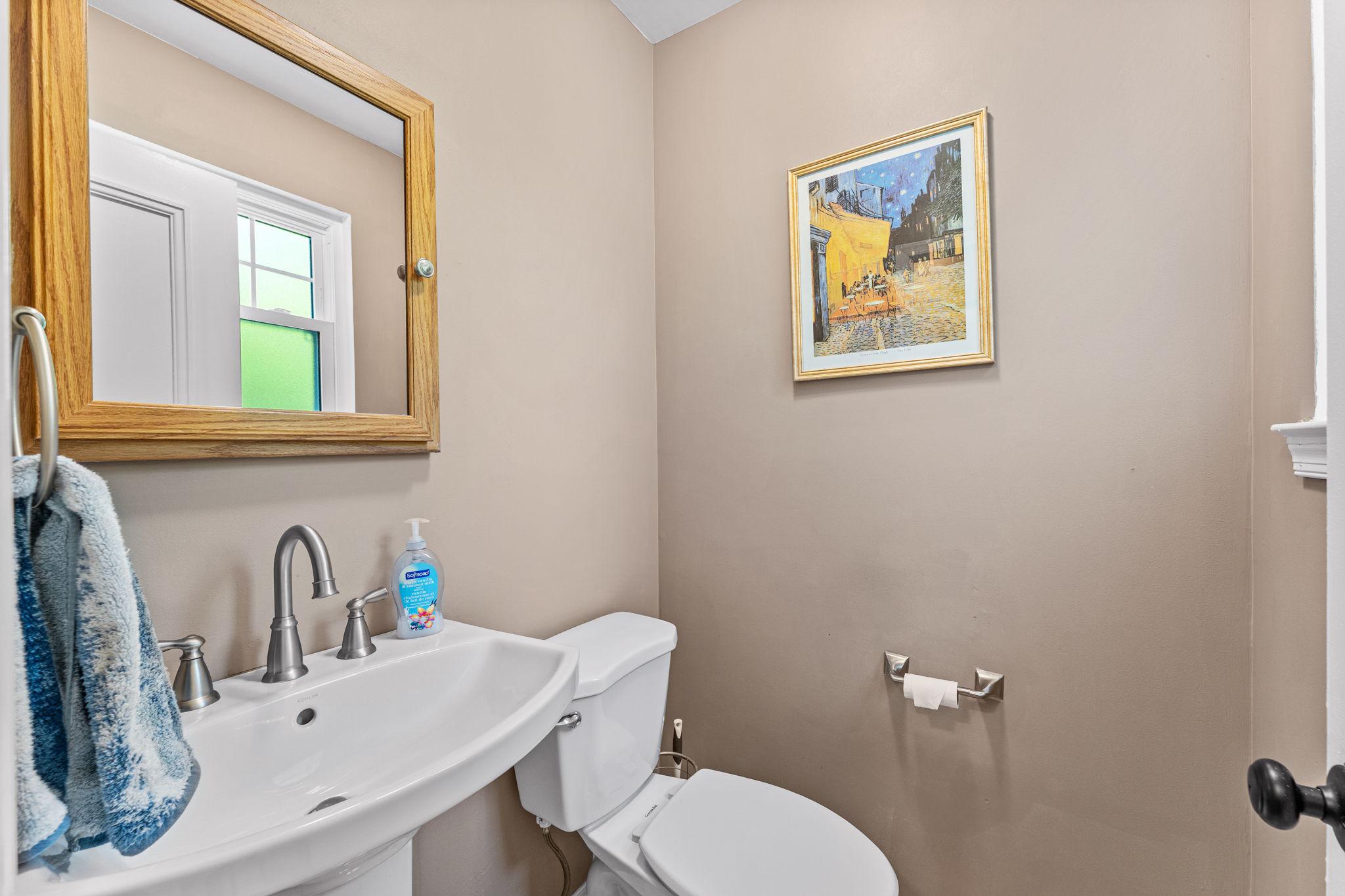 182 Wagon Wheel Road Norristown, PA 19403 - Photo 25 of 44 a bathroom with a toilet a sink and mirror