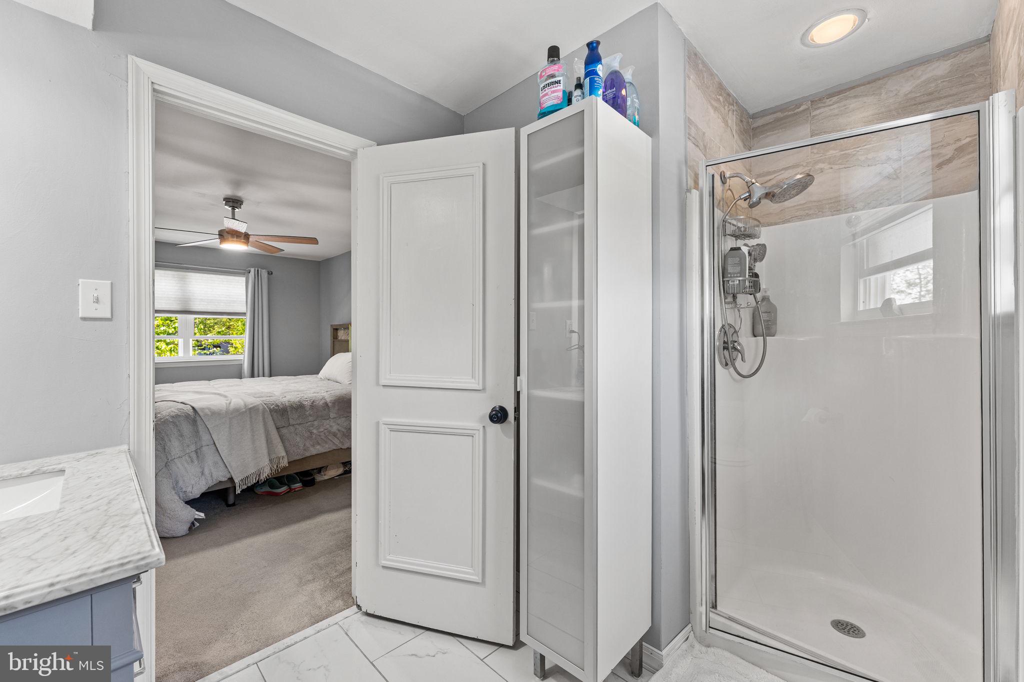 182 Wagon Wheel Road Norristown, PA 19403 - Photo 31 of 44 a bathroom with a shower and a tub