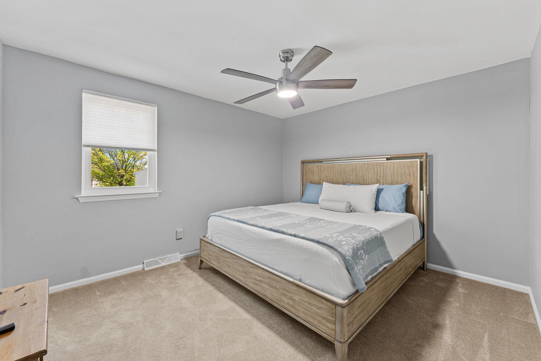 182 Wagon Wheel Road Norristown, PA 19403 - Photo 34 of 44 a bed room with a bed and a ceiling fan