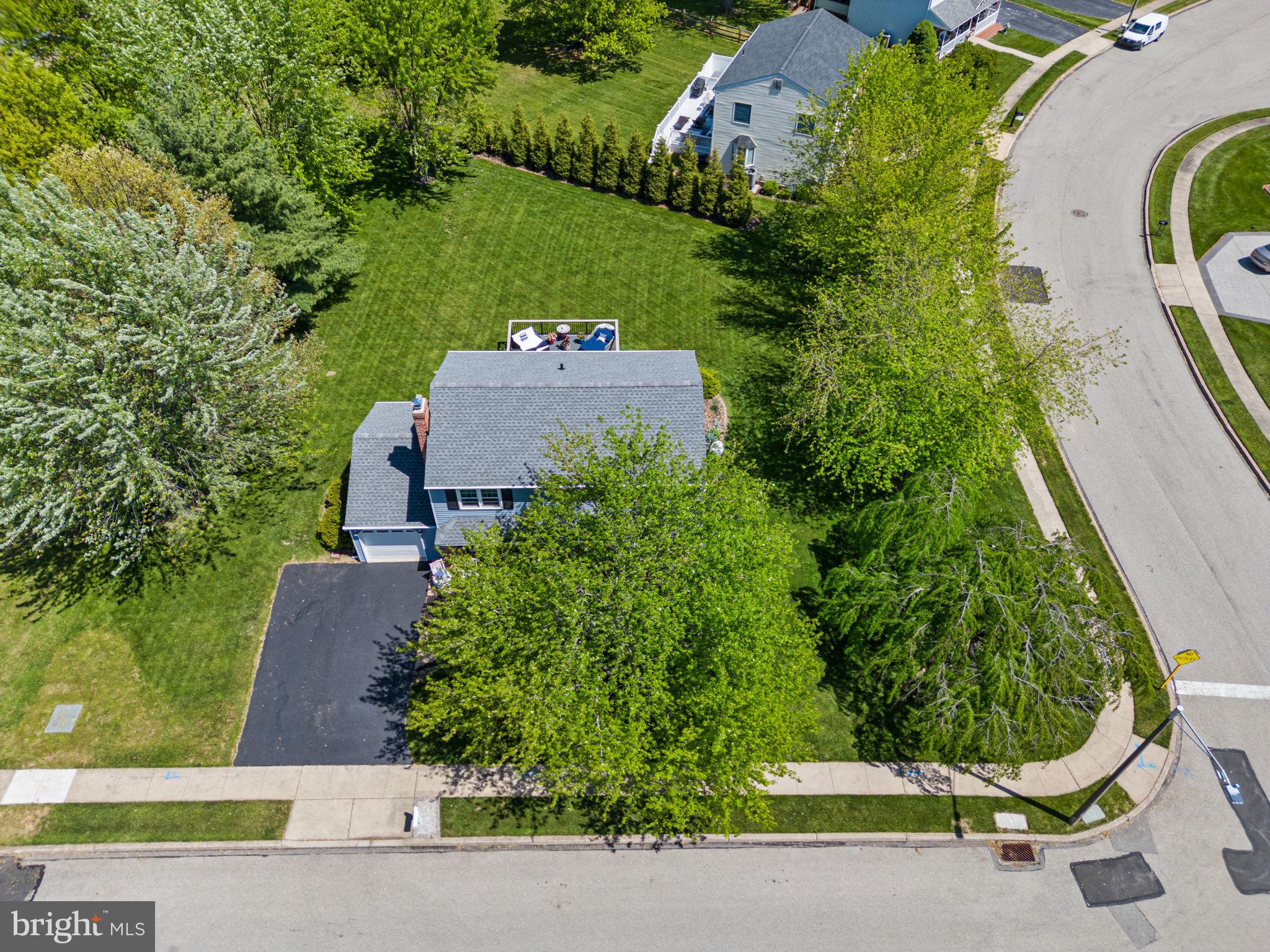 182 Wagon Wheel Road Norristown, PA 19403 - Photo 4 of 44 an aerial view of a house with a yard and garden