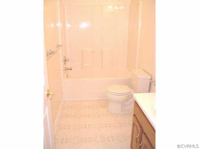 9460 Little Elam Road Charles City, VA 23030 - Photo 5 of 8 a bathroom with a toilet and a shower