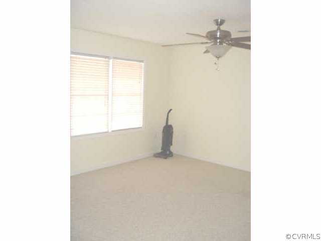 9460 Little Elam Road Charles City, VA 23030 - Photo 8 of 8 a view of an empty room with a window