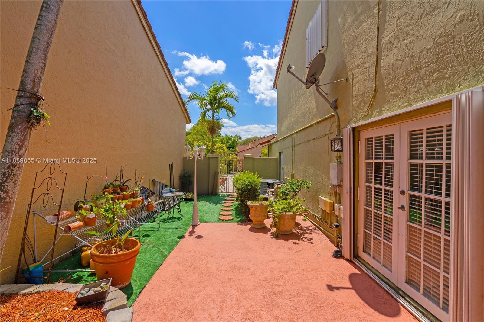 10213 Southwest 156th Avenue Miami, FL 33196 - Photo 17 of 29 a front view of a house with sitting area