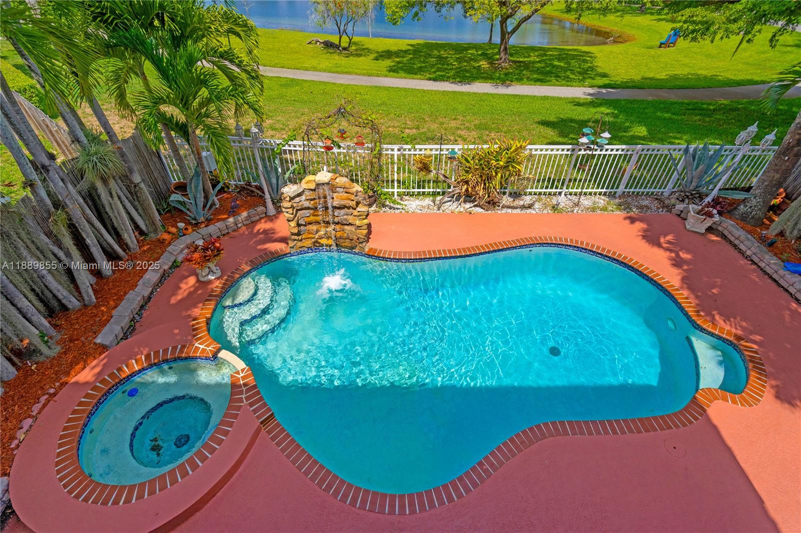 10213 Southwest 156th Avenue Miami, FL 33196 - Photo 18 of 29 an aerial view of a pool a garden and swimming pool