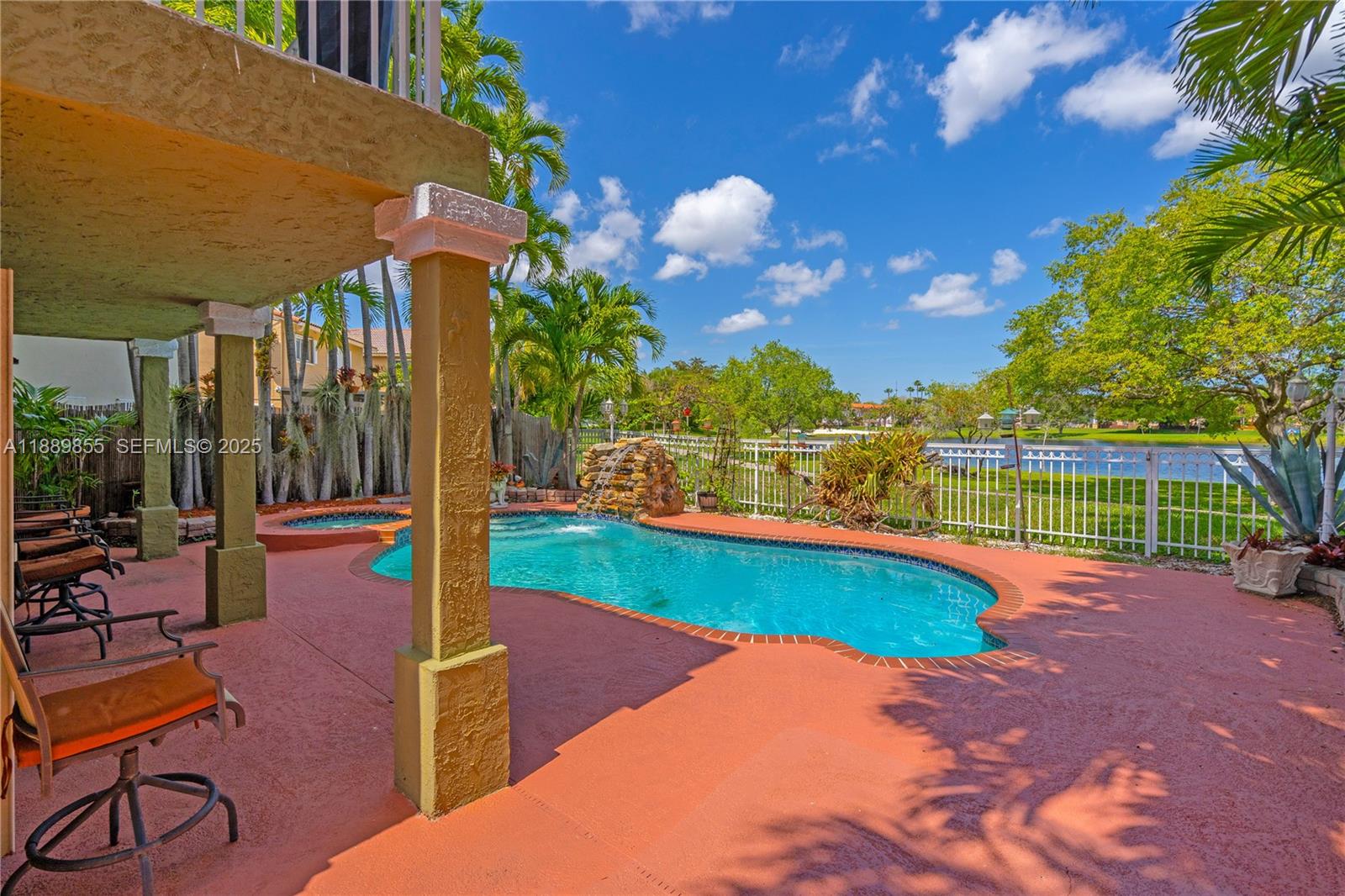 10213 Southwest 156th Avenue Miami, FL 33196 - Photo 22 of 29 a view of a backyard with swimming pool