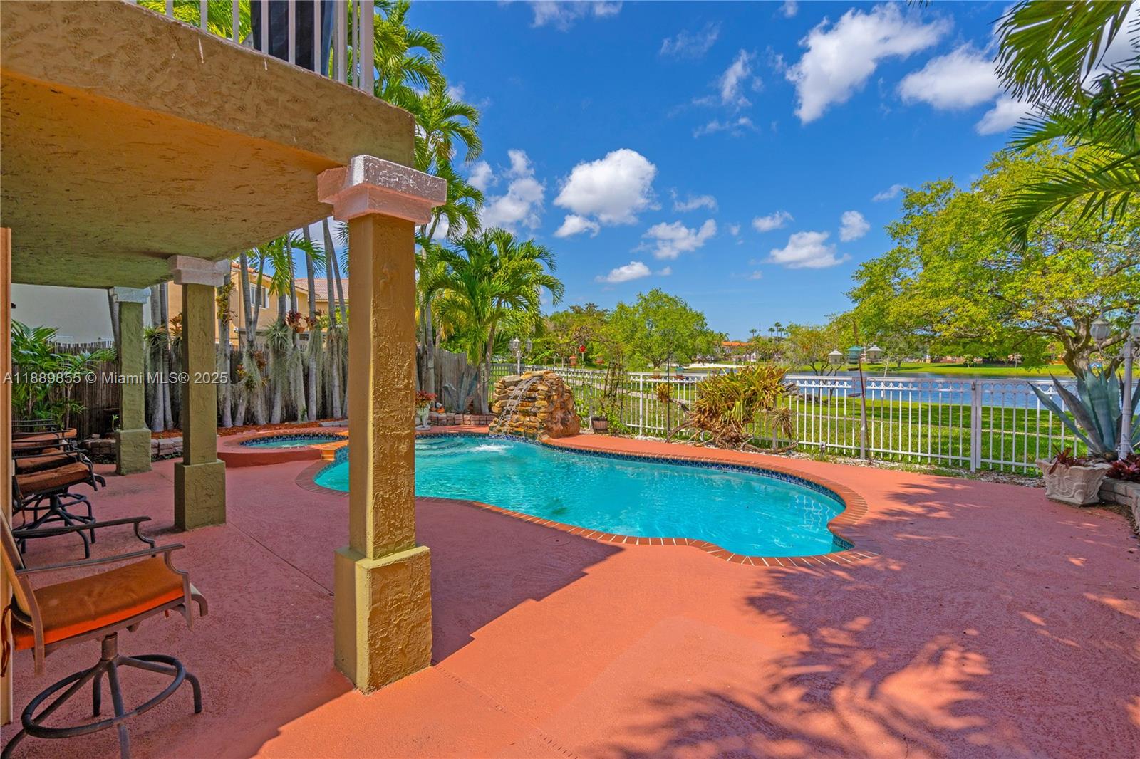 10213 Southwest 156th Avenue Miami, FL 33196 - Photo 22 of 29 a view of a backyard with swimming pool