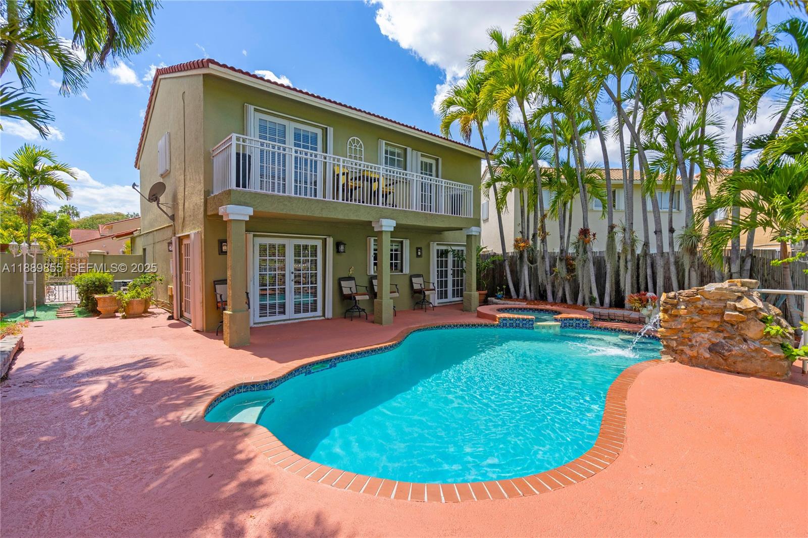 10213 Southwest 156th Avenue Miami, FL 33196 - Photo 23 of 29 front view of a house with a yard