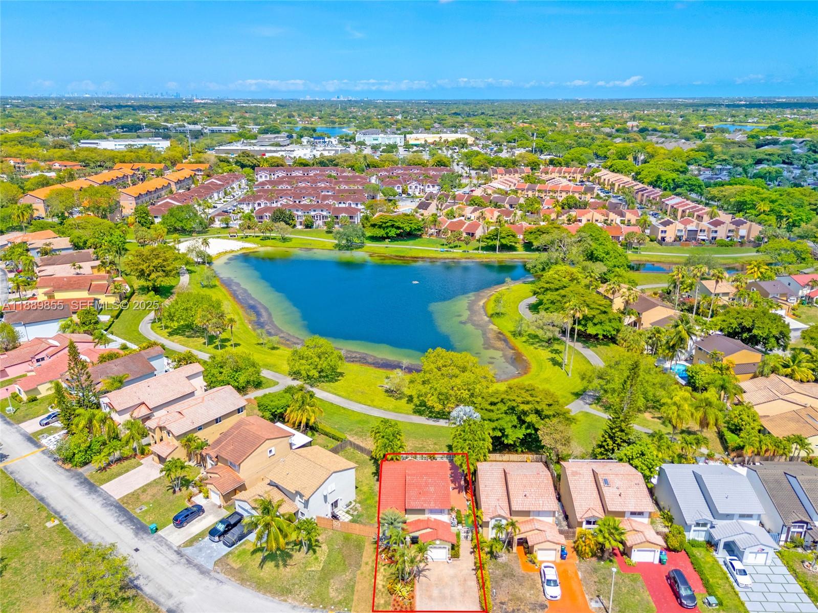 10213 Southwest 156th Avenue Miami, FL 33196 - Photo 28 of 29 an aerial view of residential houses with outdoor space