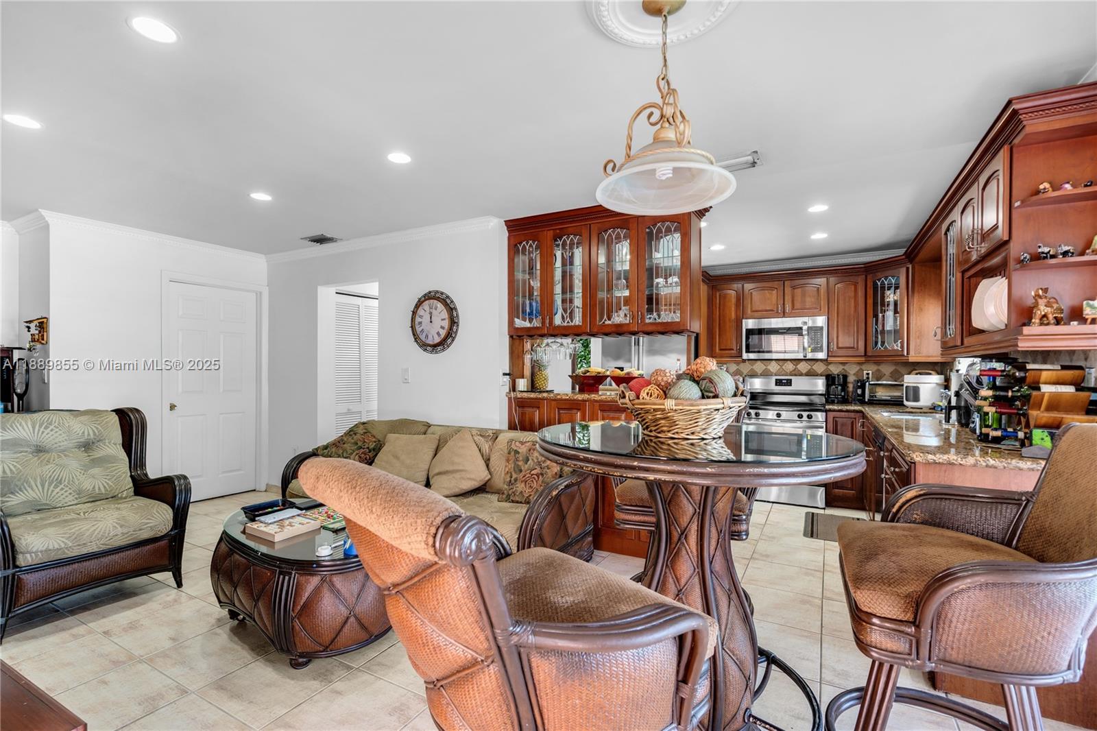 10213 Southwest 156th Avenue Miami, FL 33196 - Photo 6 of 29 a view of a dining room with furniture
