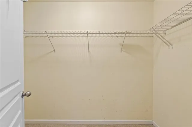 a bathroom with a sink vanity tub and shower