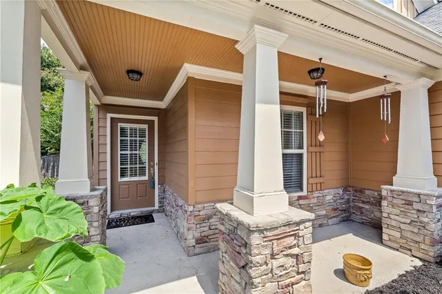a front view of house with outdoor seating