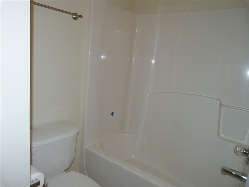 422 Arrowhead Trail Canton, GA 30114 - Photo 44 of 51 a bathroom with a bathtub and toilet