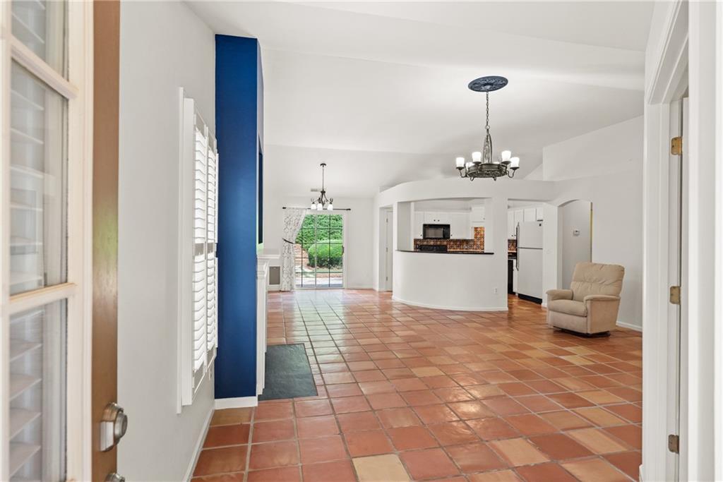 422 Arrowhead Trail Canton, GA 30114 - Photo 5 of 51 a view of a hallway to a livingroom with furniture