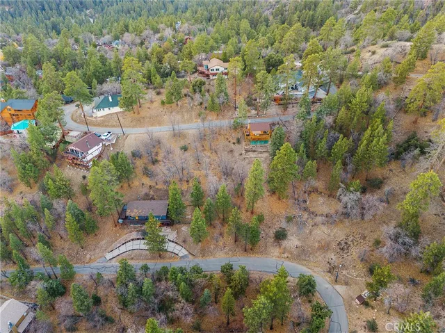 an aerial view of residential house with outdoor space