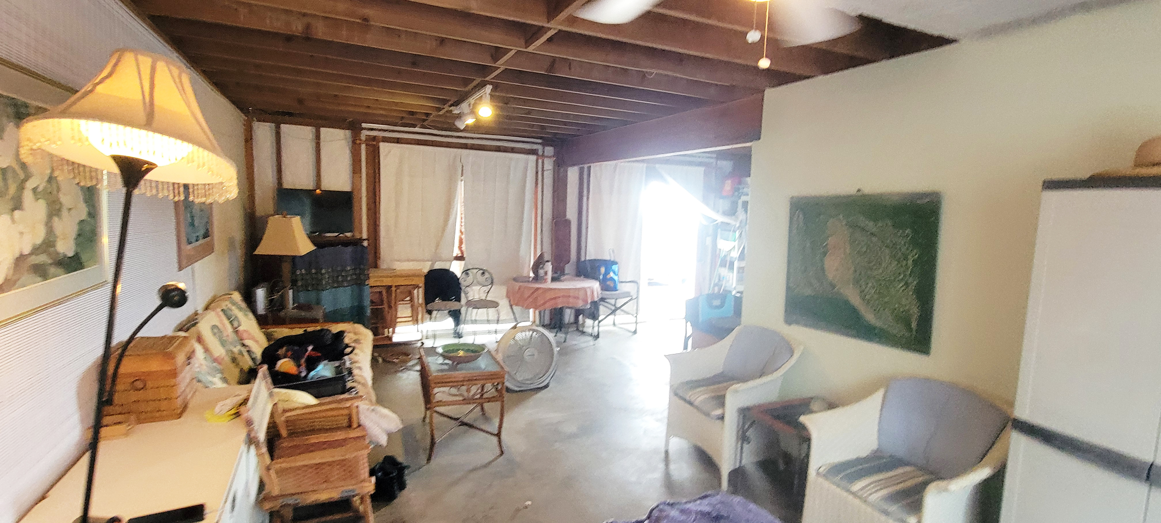 88-1520 Ehiku Avenue Captain Cook, HI 96704 - Photo 16 of 29 a view of a dining room with furniture and chandelier