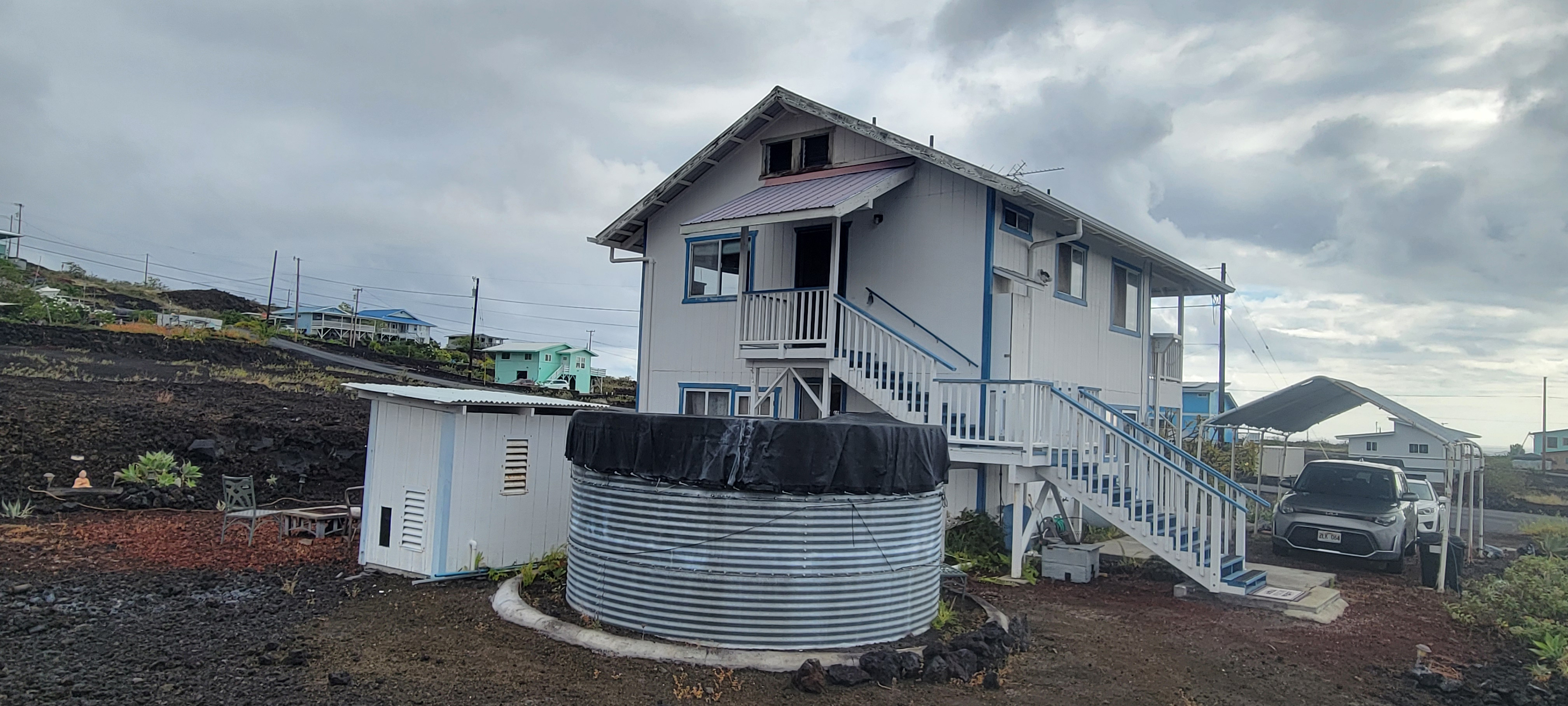 88-1520 Ehiku Avenue Captain Cook, HI 96704 - Photo 23 of 29 a front view of a house with garden