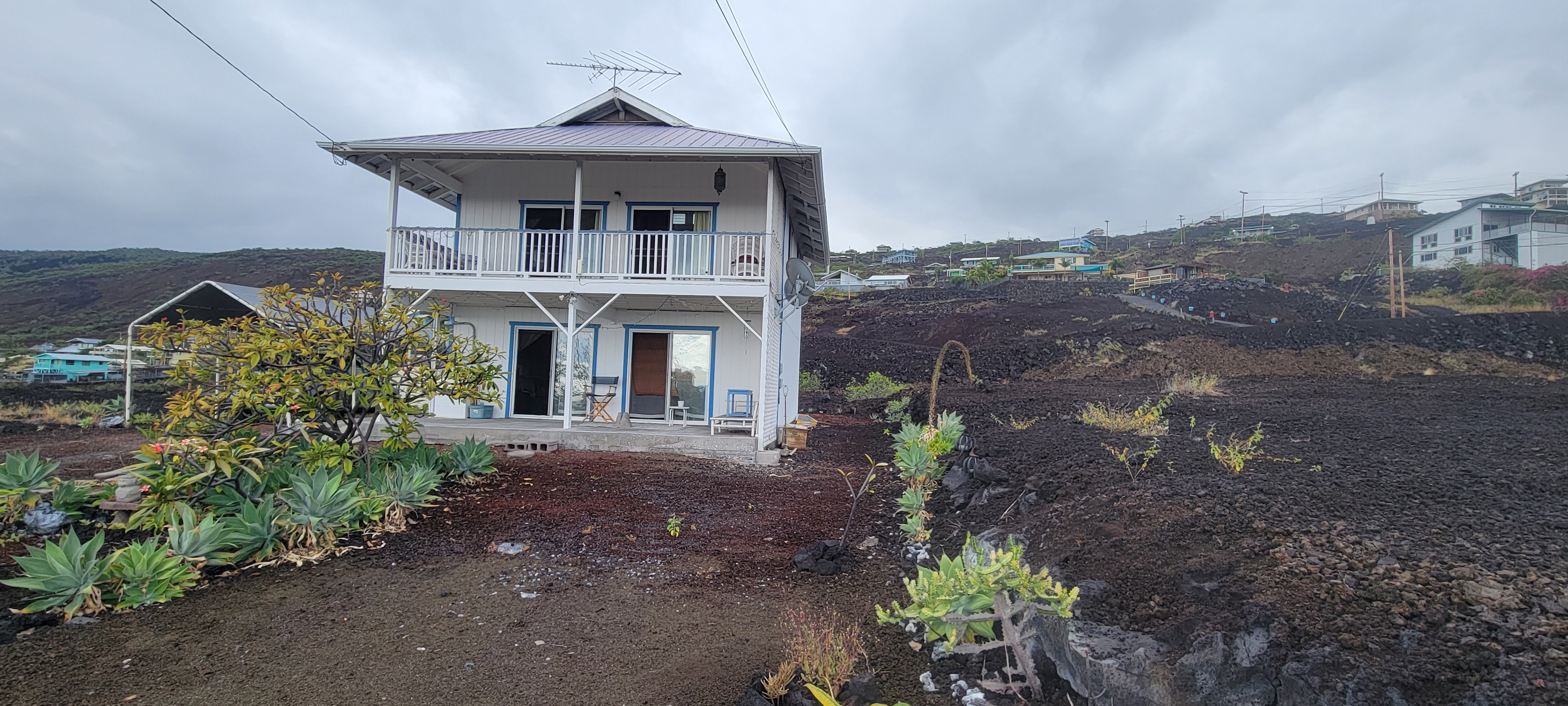 88-1520 Ehiku Avenue Captain Cook, HI 96704 - Photo 26 of 29 a front view of a house with a yard