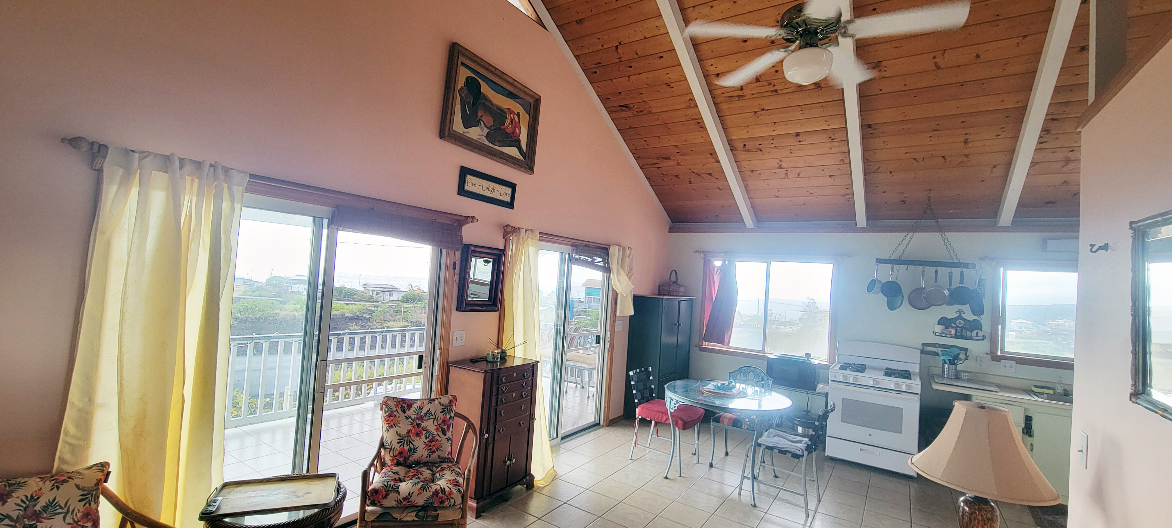88-1520 Ehiku Avenue Captain Cook, HI 96704 - Photo 6 of 29 a living room with furniture and a large window